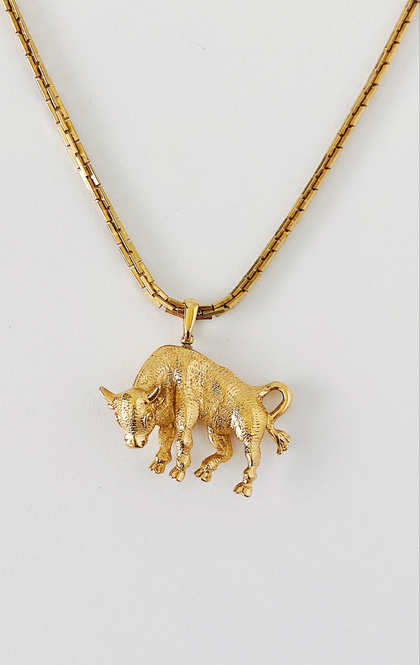 Vintage 1950s/60s Monet Taurus bull pendant necklace, triple gold plated box chain, zodiac sign jewelry, 16-inch layering necklace