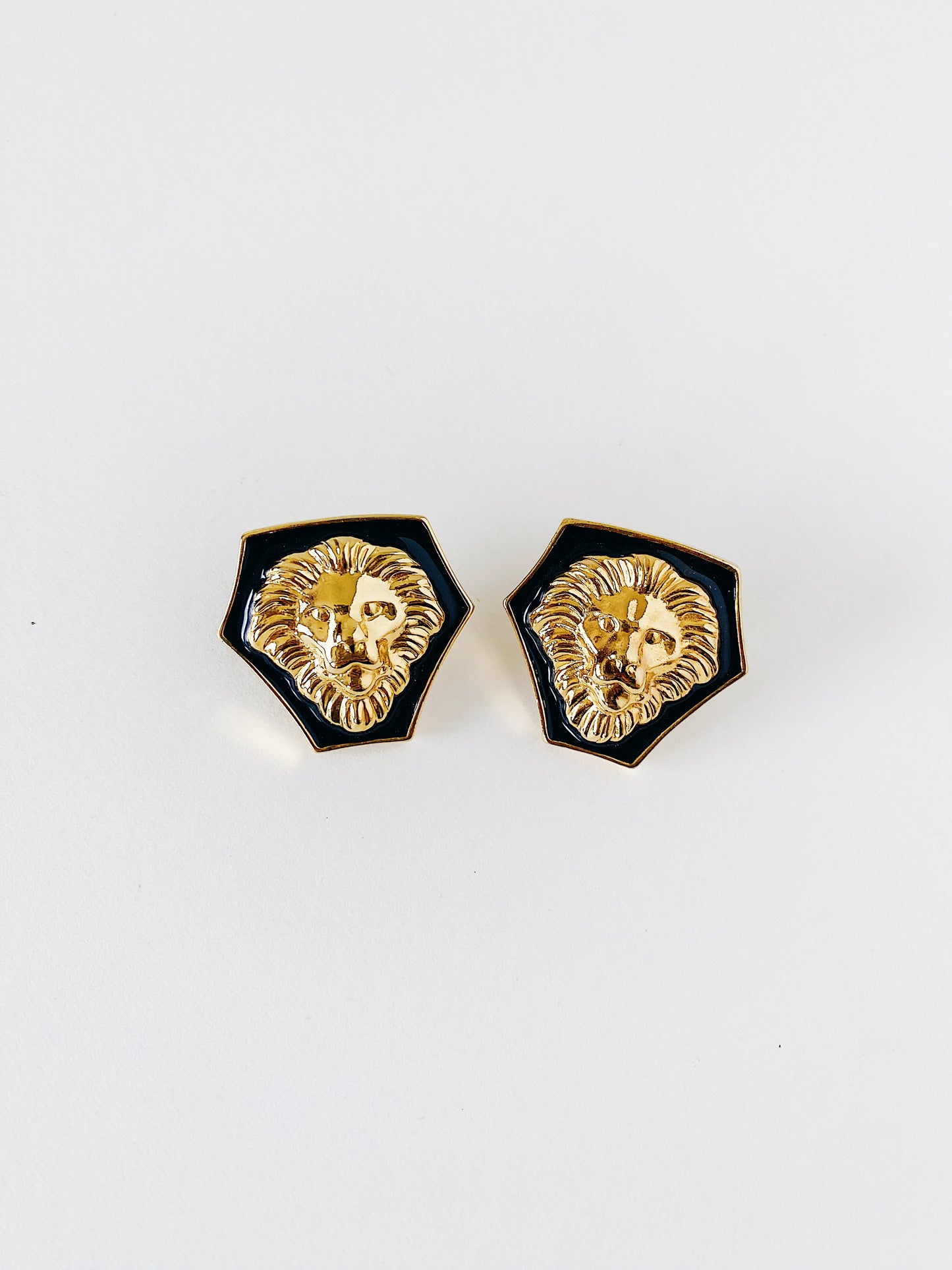 Vintage 1980s/1990s Avon lion head earrings, gold plated with black enamel, steel posts, statement power earrings