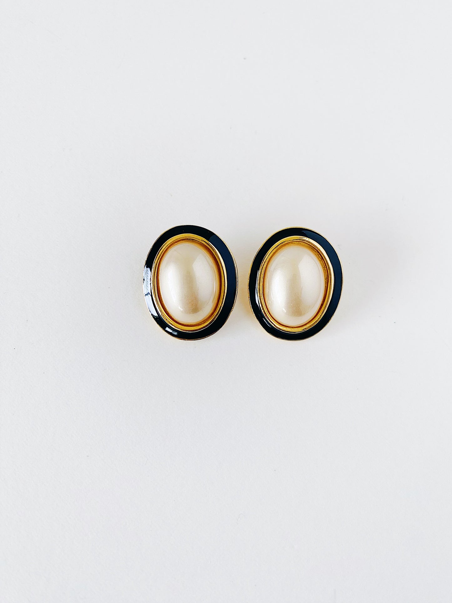 Vintage 1980s Carolee clip-on earrings, faux pearl with black enamel and gold-plated trim, matching necklace available