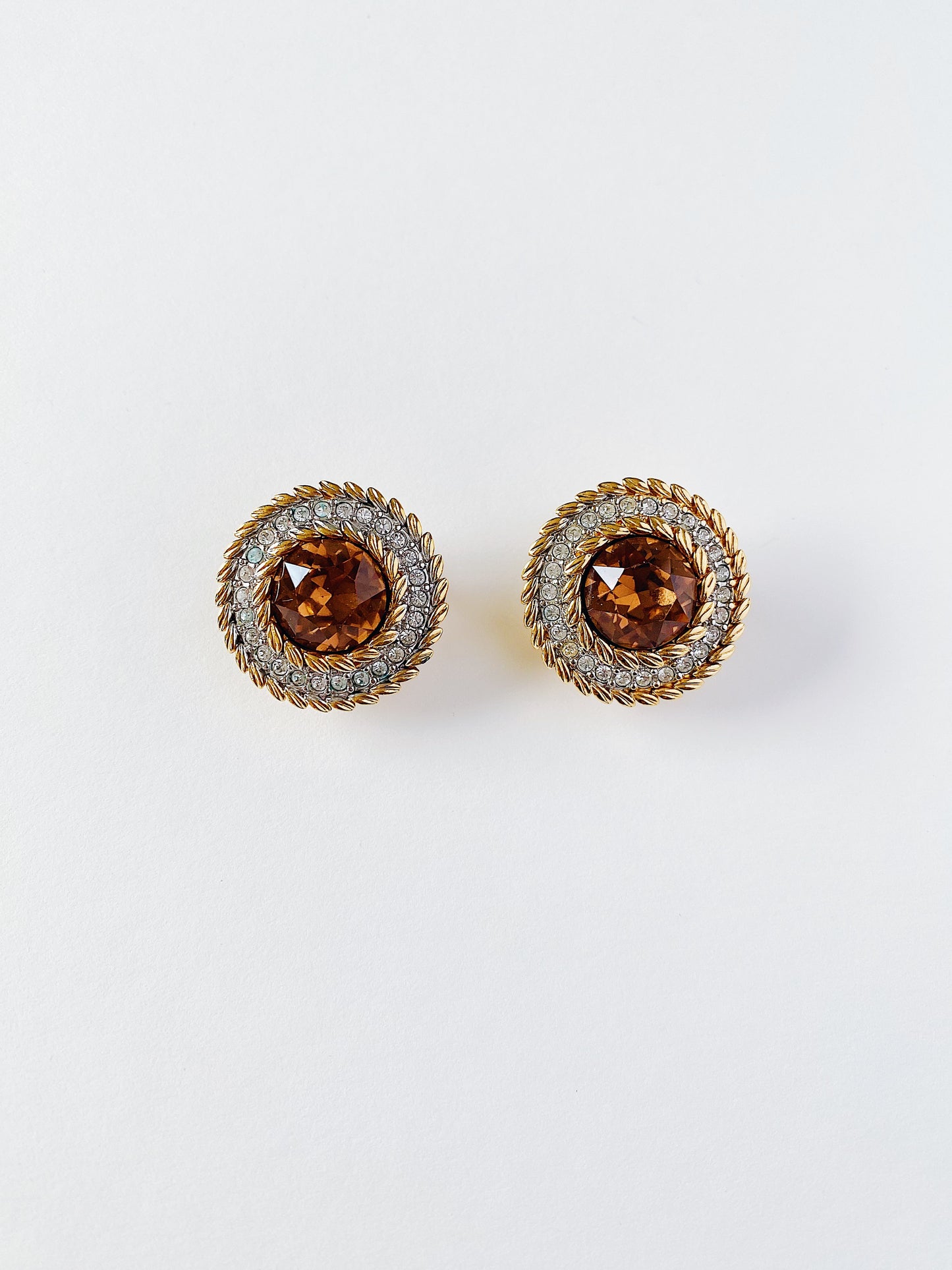 Vintage Swarovski S.A.L amber crystal and rhinestone gold-plated clip-on earrings, 1977–1988.