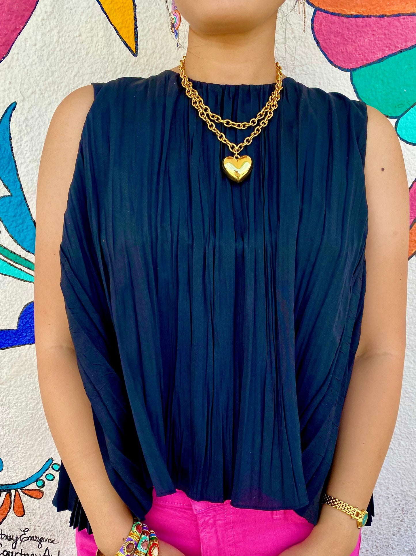 Vintage 1993 Avon gold tone puffy heart necklace with double chain design and adjustable closure. Romantic vintage jewelry measuring 17.5 inches.