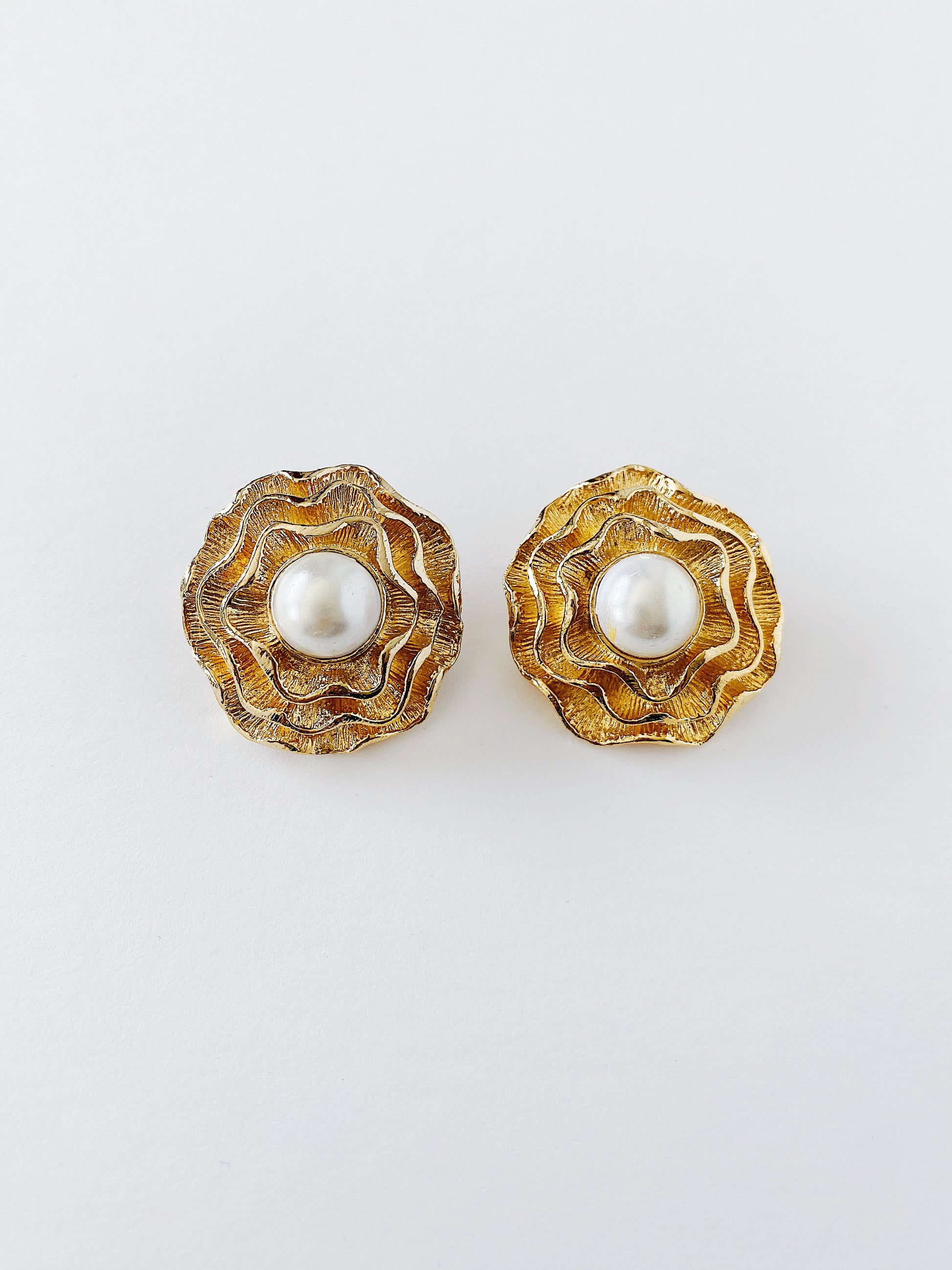 Vintage 1980s pearl flower ruffled statement earrings, multilayer gold-tone floral design, large faux pearl, clip-on earrings.