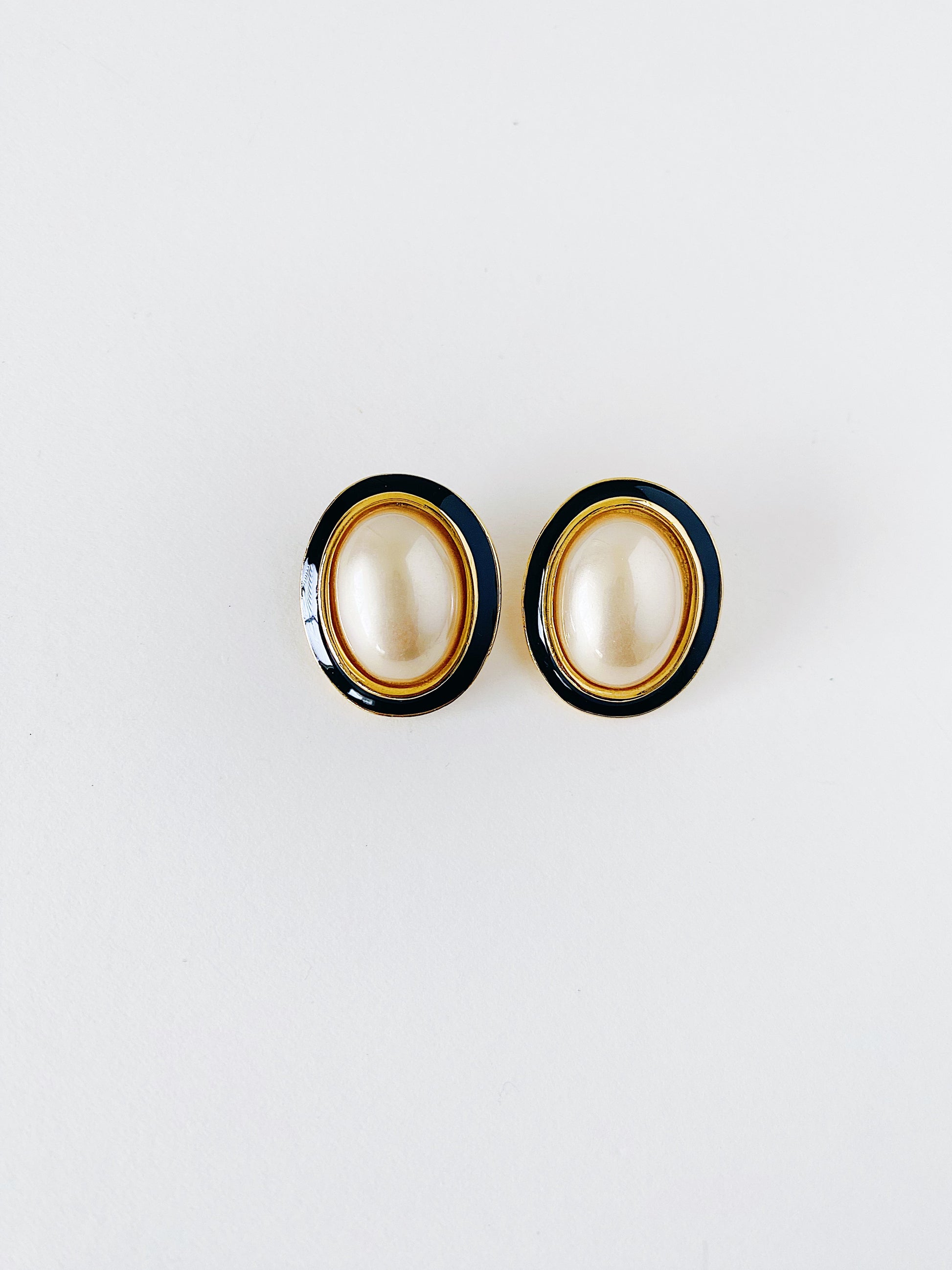 Vintage 1980s Carolee clip-on earrings, faux pearl with black enamel and gold-plated trim, matching necklace available