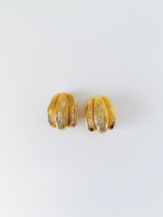 Vintage 1980s St. John sculptural shell earrings, 24K gold-plated clip-ons, bold textured statement earrings, classic coastal design.