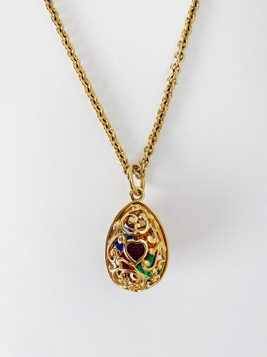 Vintage 1990s Kenneth Jay Lane (KJL) gold-tone egg pendant necklace with jewel-toned rhinestones
