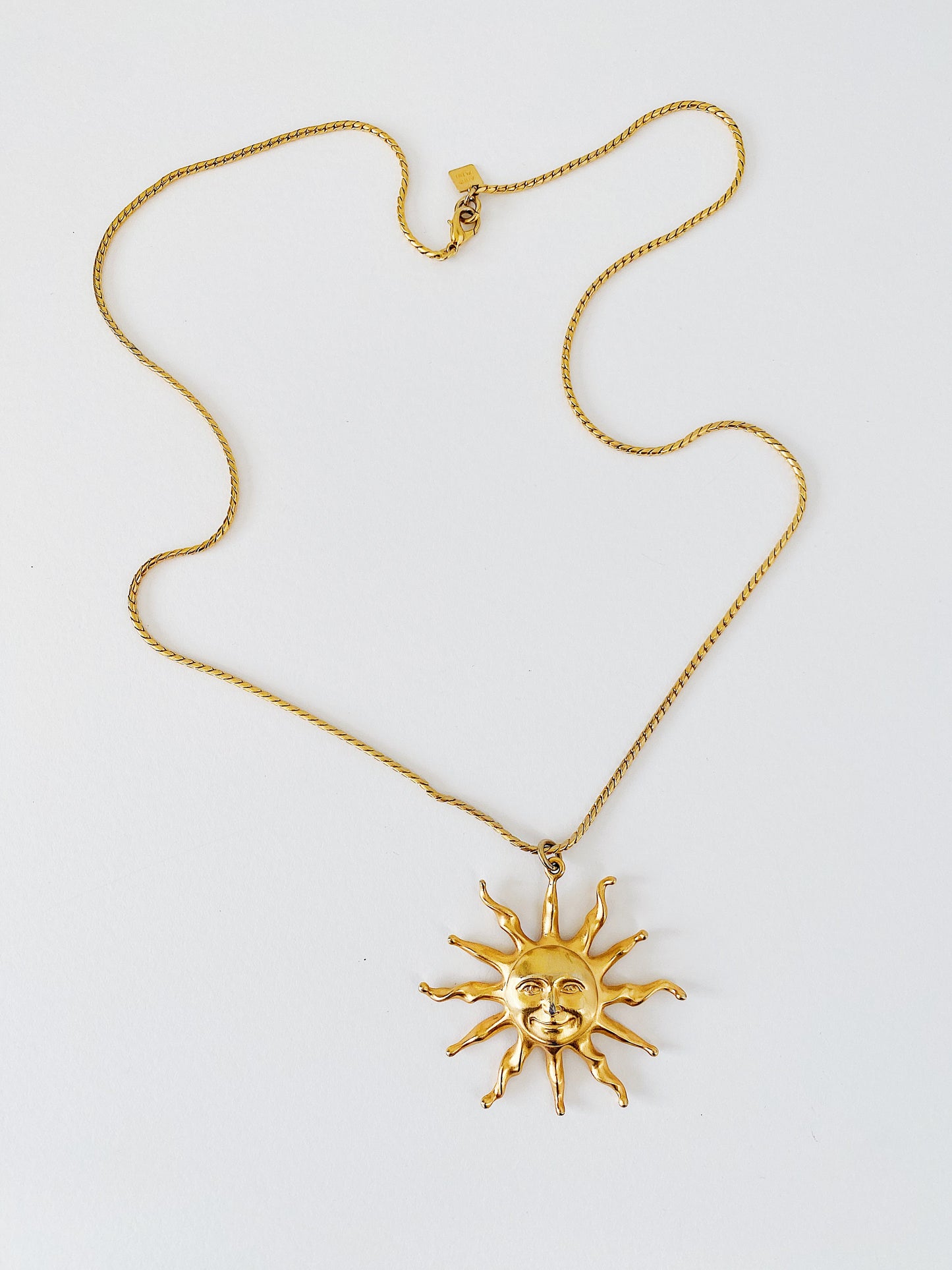 Vintage Anne Klein celestial sun pendant necklace, 31 inch foxtail chain, signed pendant with lion logo hangtag, gold-tone statement necklace.