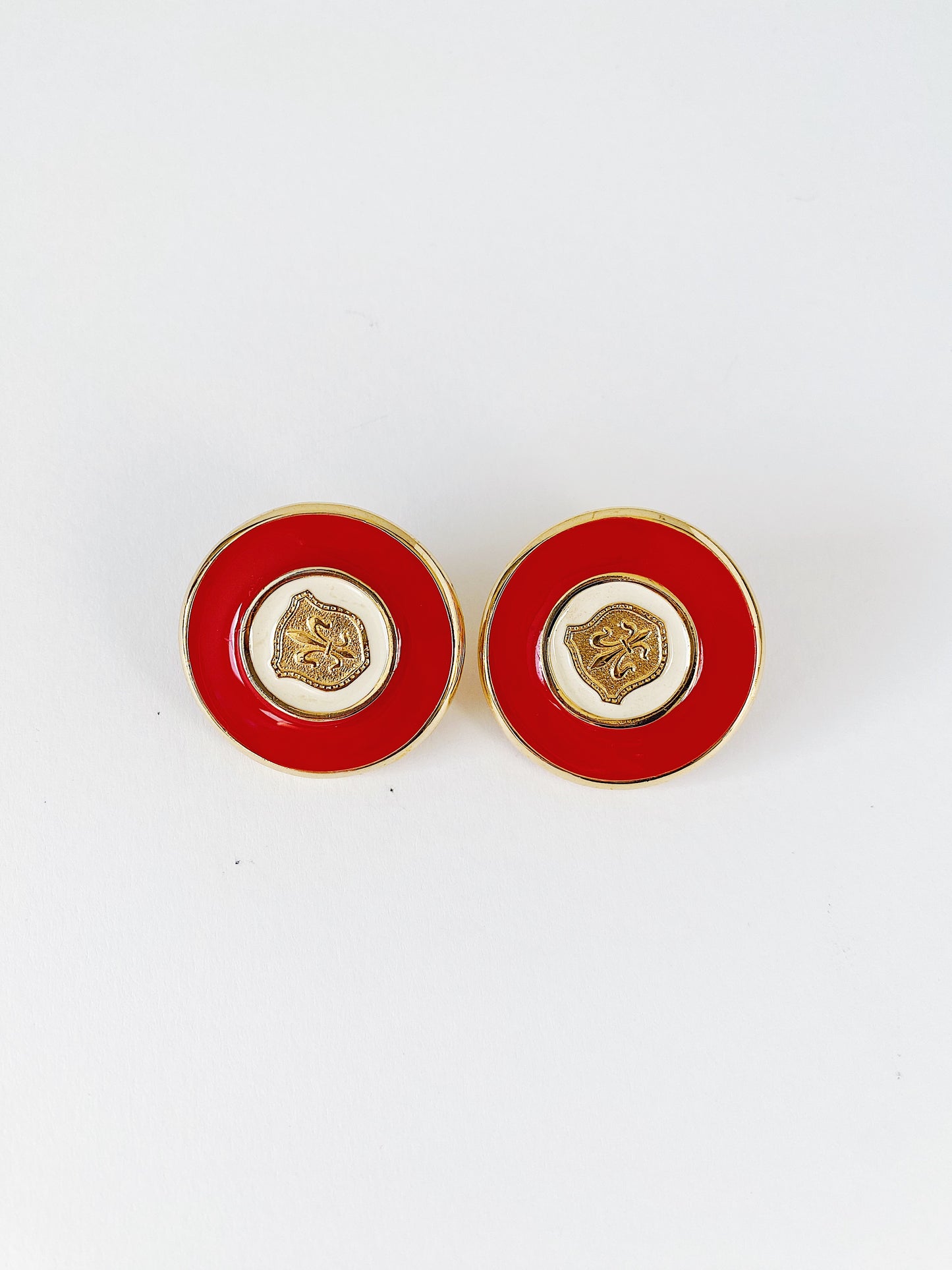 Vintage GJD Ginnie Johansen Danson clip-on earrings, red and white enamel button earrings with gold fleur-de-lis, oversized 1980s statement jewelry.
