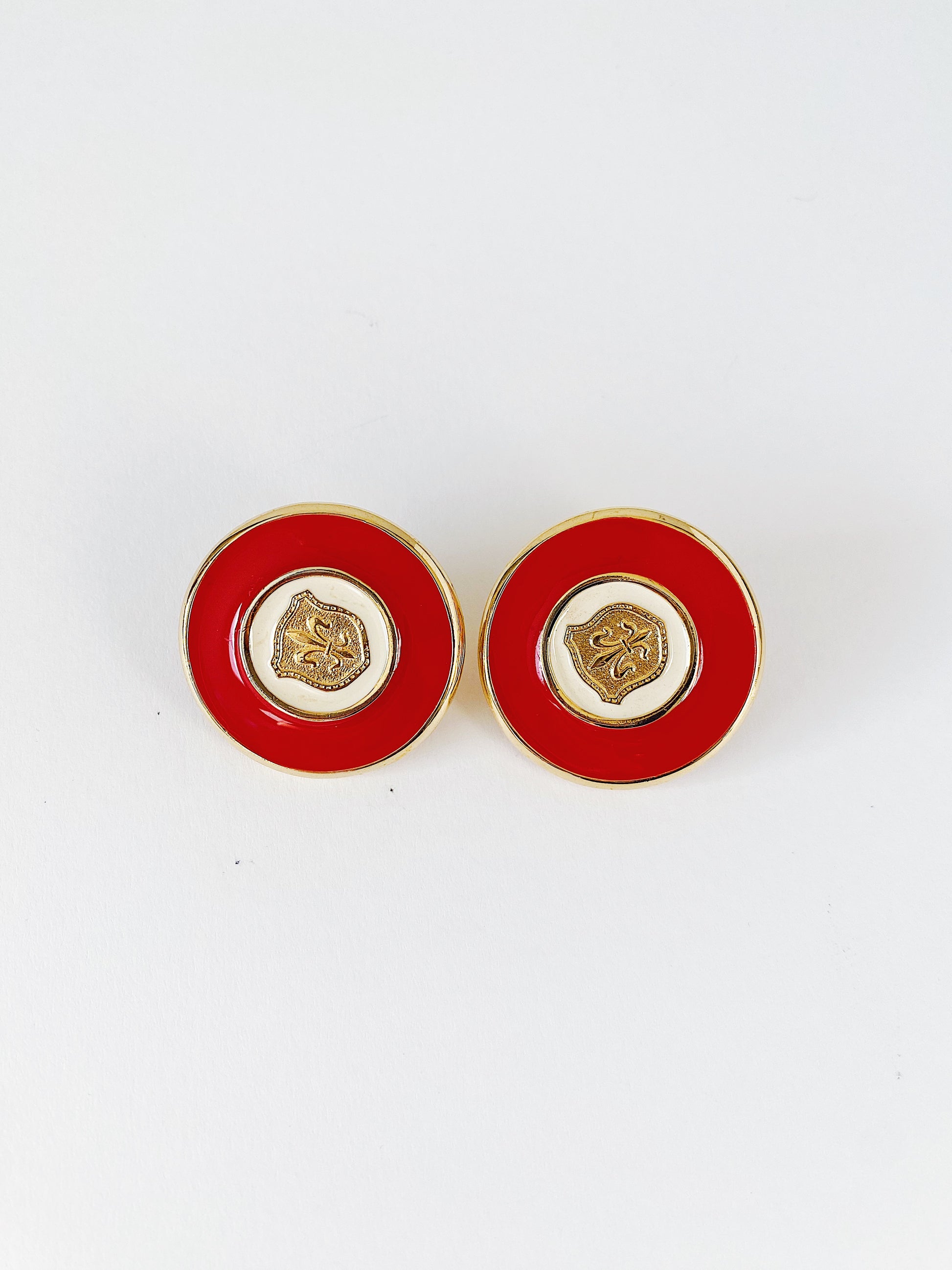 Vintage GJD Ginnie Johansen Danson clip-on earrings, red and white enamel button earrings with gold fleur-de-lis, oversized 1980s statement jewelry.