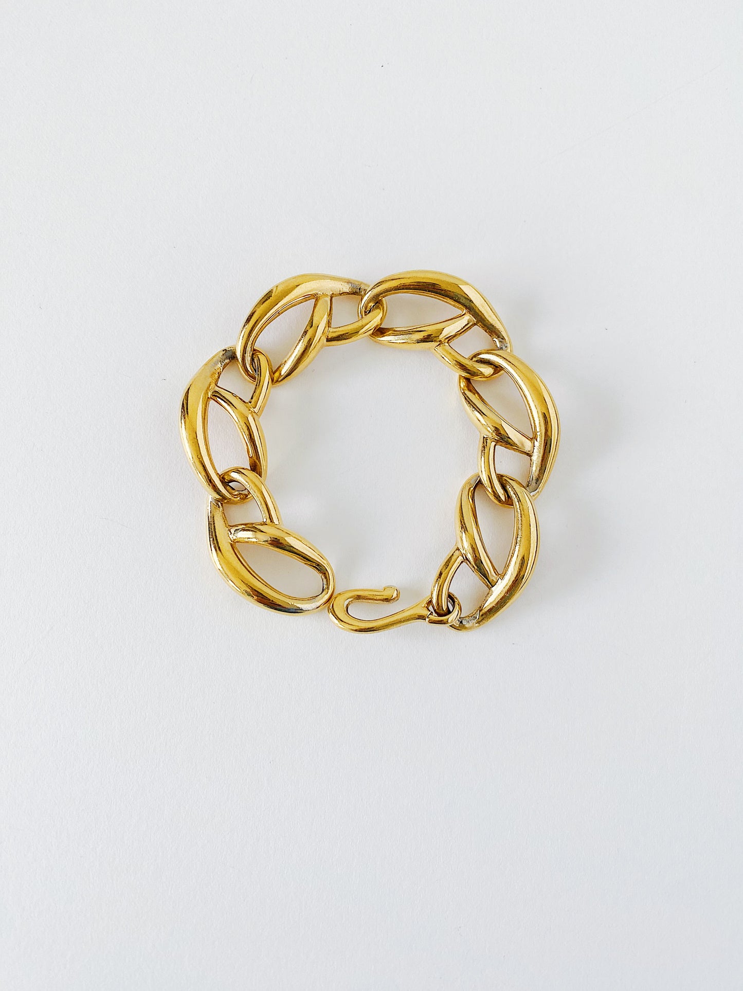 Vintage Givenchy gold plated bracelet, 1980s curved link chain, 8 inch mid-weight designer bracelet