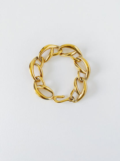 Vintage Givenchy gold plated bracelet, 1980s curved link chain, 8 inch mid-weight designer bracelet