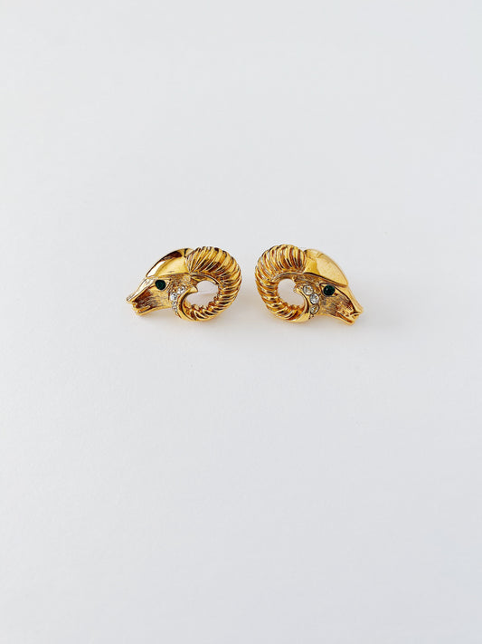 Vintage KJL Kenneth Jay Lane for Avon ram earrings, gold-plated with emerald green crystal eyes and clear crystal accents, 1980s zodiac Capricorn earrings