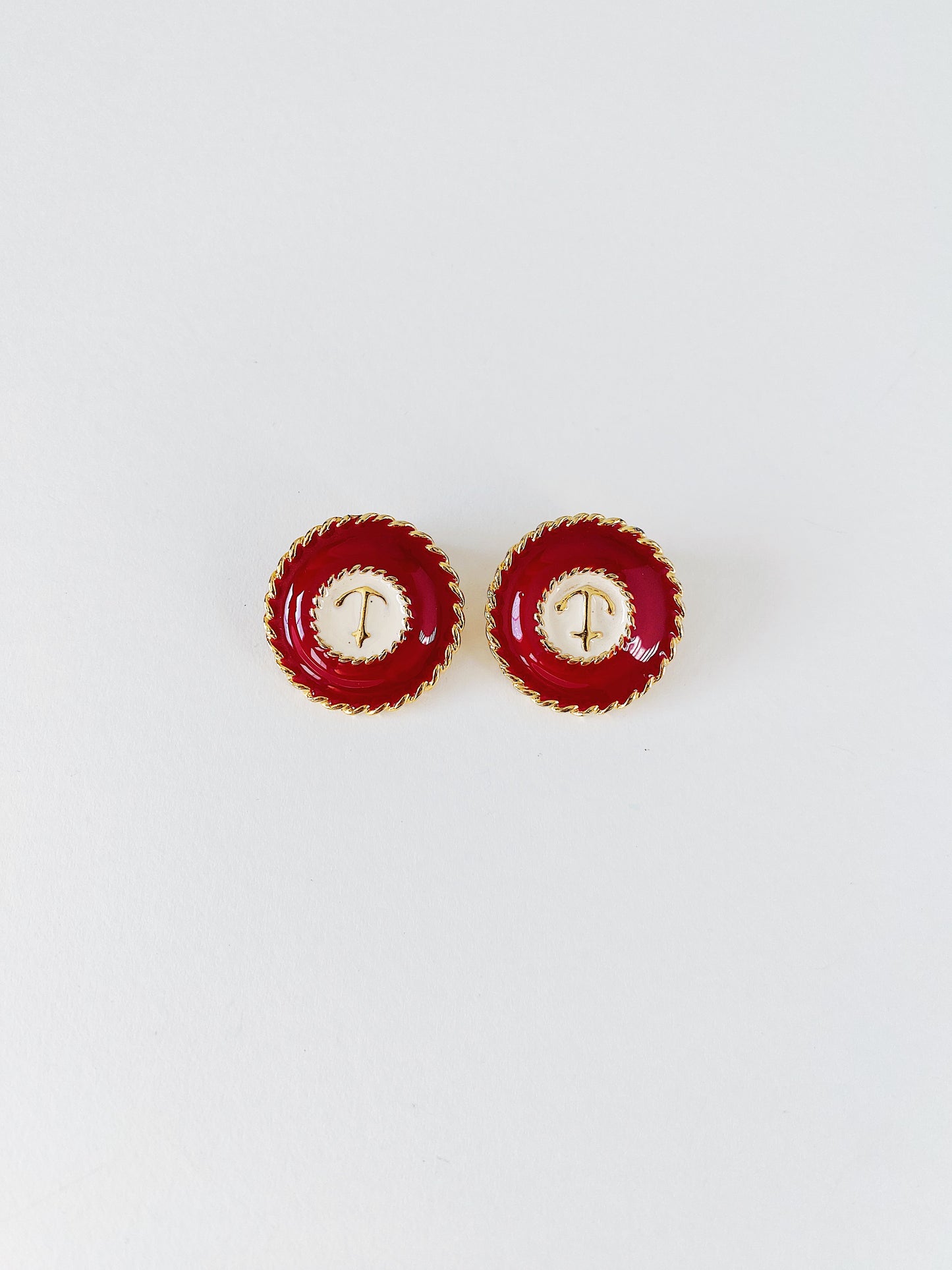 Vintage nautical anchor clip-on earrings, red and white enamel with dimensional gold anchor and rope detailing, mid-weight coastal statement jewelry.