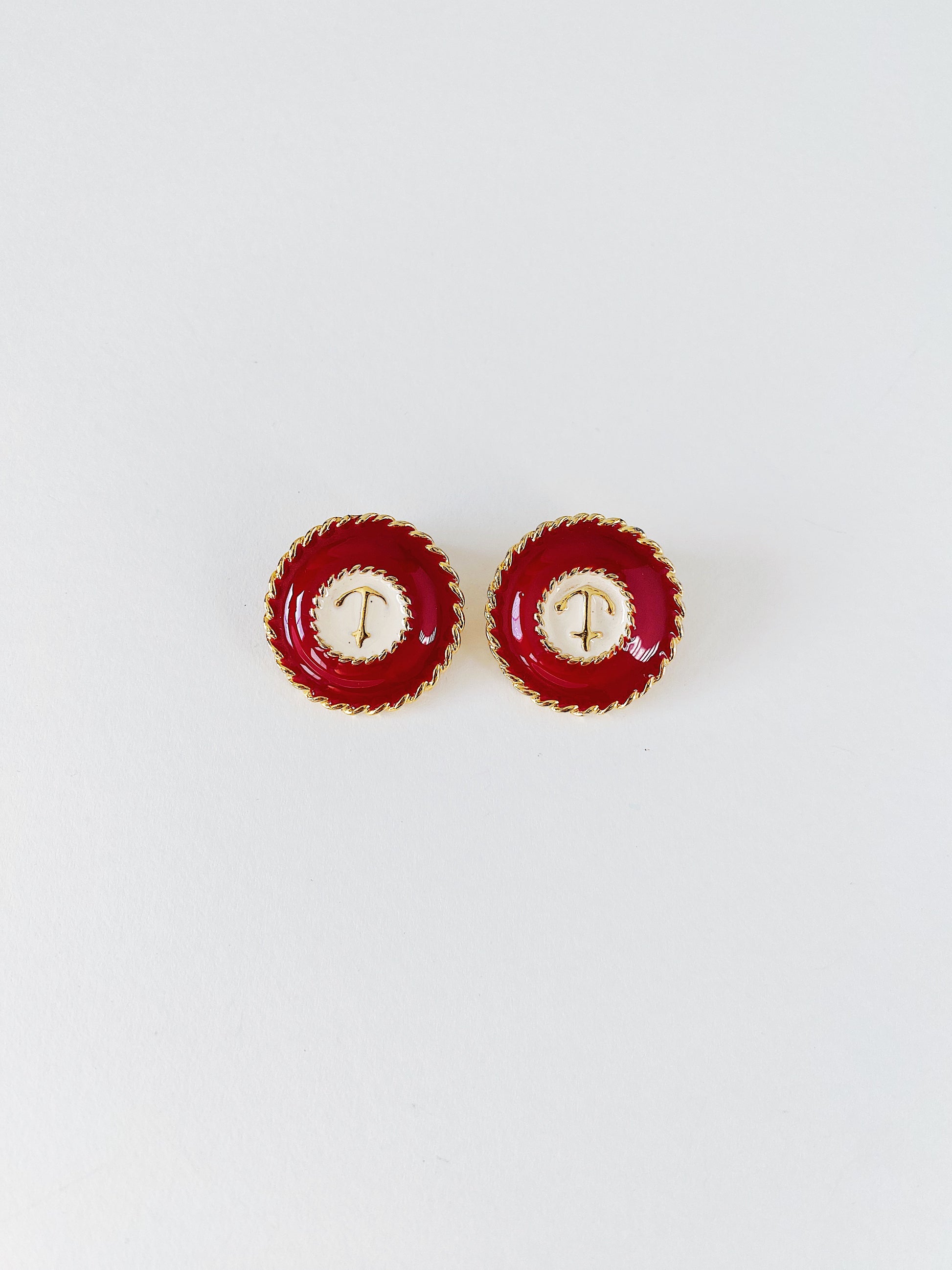 Vintage nautical anchor clip-on earrings, red and white enamel with dimensional gold anchor and rope detailing, mid-weight coastal statement jewelry.
