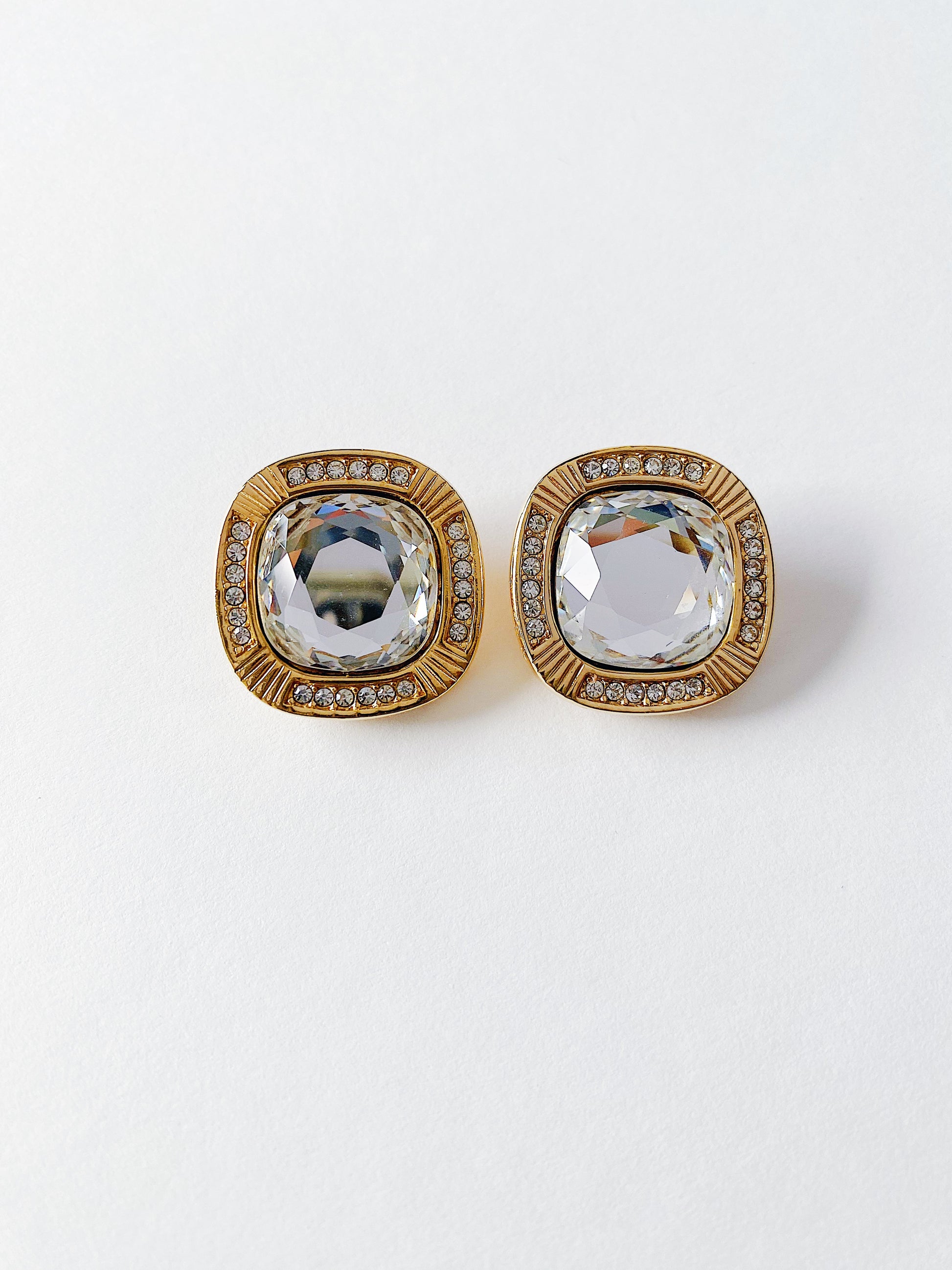 Vintage Swarovski S.A.L clear cushion-cut crystal clip-on earrings with clear crystal surround, gold plated, 1980s collectible jewelry.