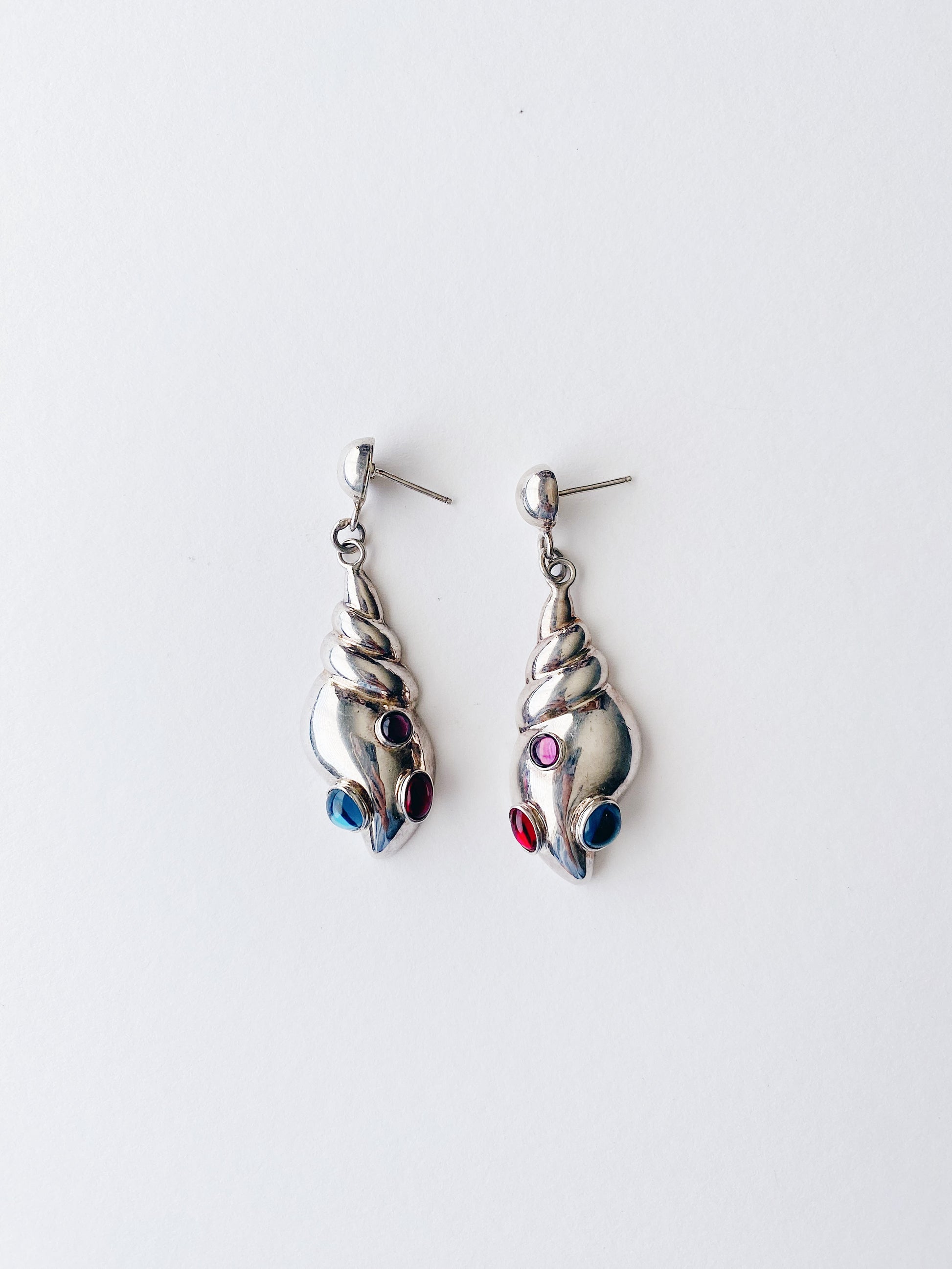 Vintage sterling silver sculptural seashell earrings with blue, red, and magenta lucite gem accents, lightweight post earrings, marked sterling.